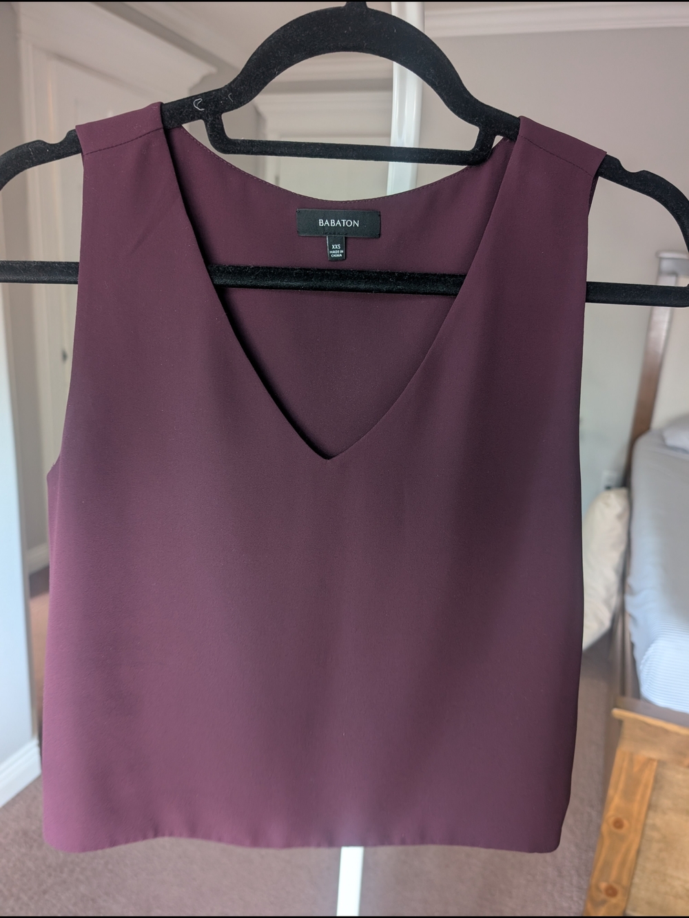 Babaton Sleeveless V-Neck Top in Plum